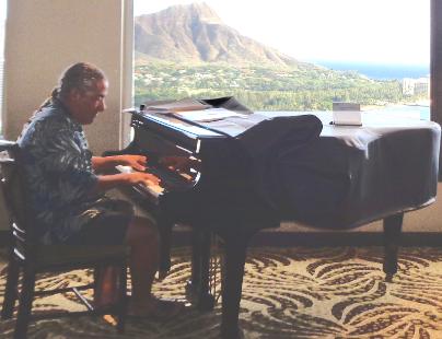 Theodore Teo Barry Vincent IV, Exceptional Pianist at Sheritan Leahi Lounge, Honolulu, Hawaii, USA. You can see the Leahi - peak of